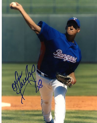 OMAR POVEDA TEXAS RANGERS SIGNED 8X10 PHOTO