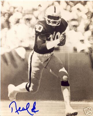 NEAL COLZIE B/W OAKLAND RAIDERS SIGNED 8X10