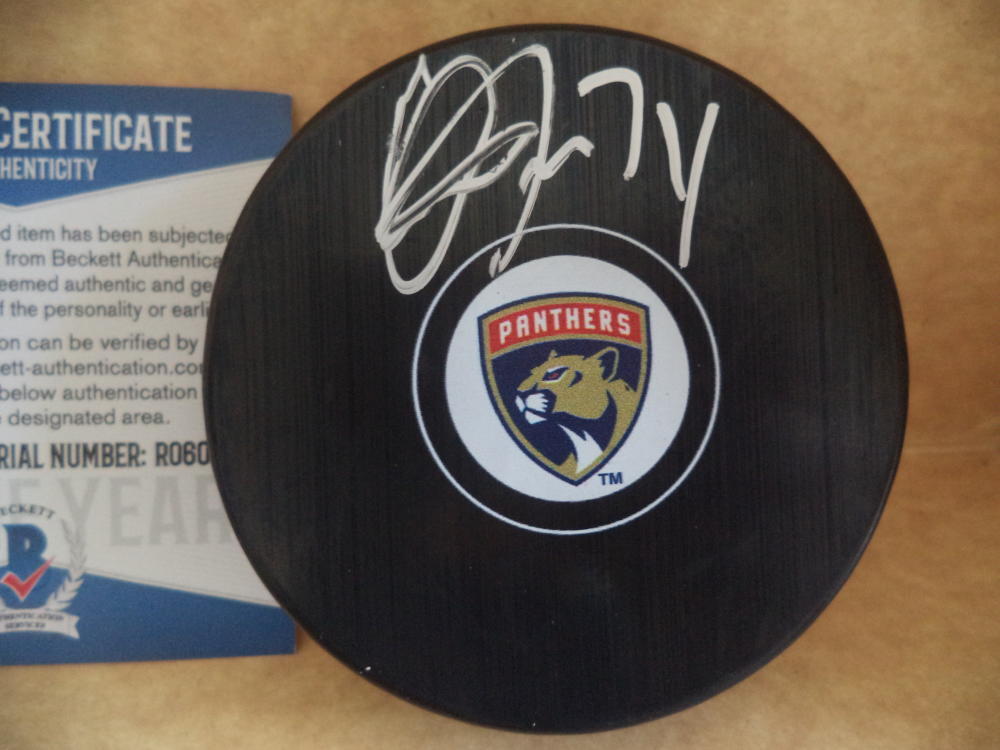 OWEN TIPPETT FLORIDA PANTHERS SIGNED AUTO PUCK ROOKIE YEAR BECKETT R06026