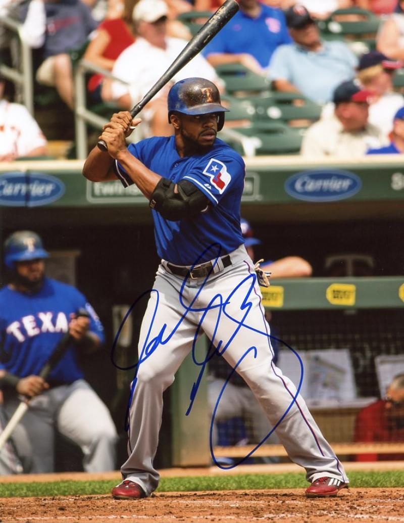 DELINO DESHIELDS HITTING TEXAS RANGERS SIGNED 8X10 PHOTO W/COA