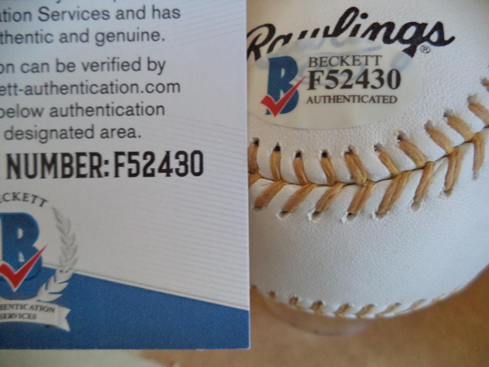 CARLOS GONZALEZ ROCKIES SIGNED UNER GOLD GLOVE AWARD BASEBALL BECKETT F52430