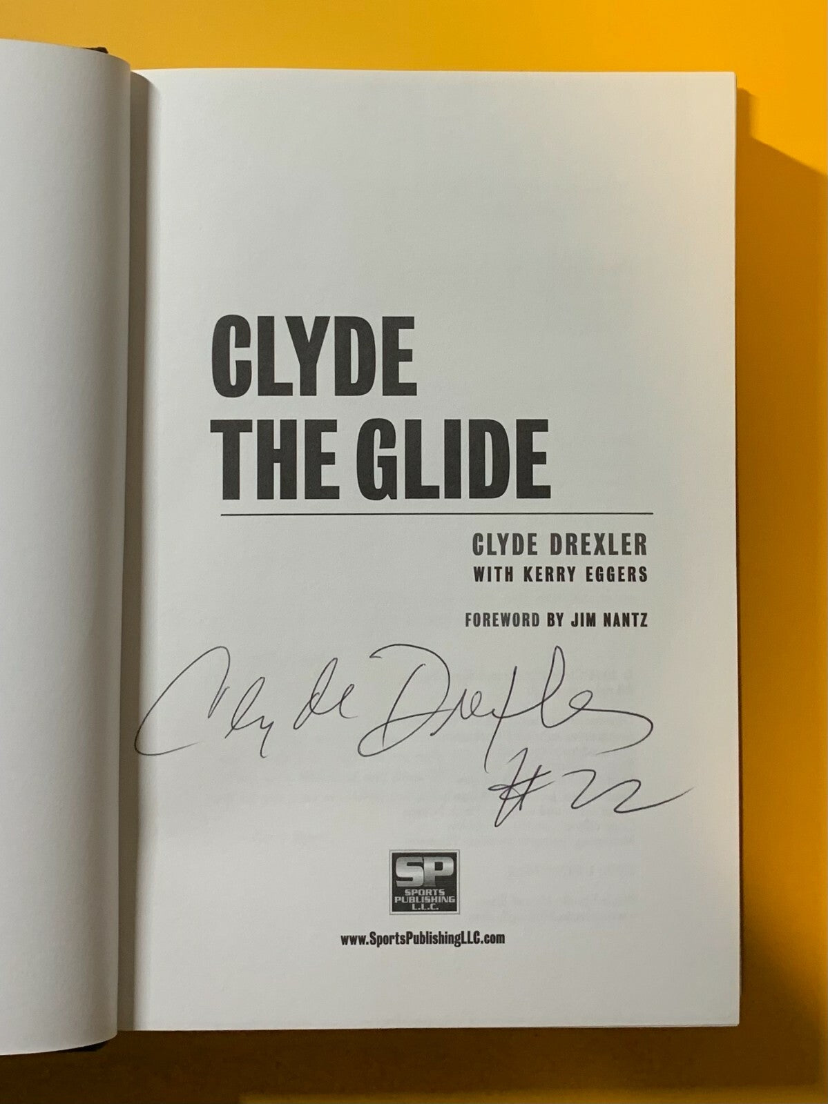 CLYDE DREXLER SIGNED BOOK CLYDE THE GLIDE W/ COA TRAIL BLAZERS HOF