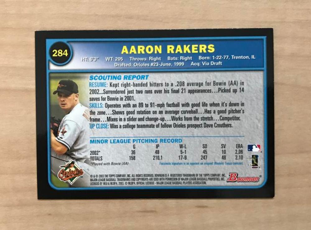 AARON RAKERS BALTIMORE ORIOLES SIGNED AUTOGRAPHED 2003 BOWMAN CARD #284 W/COA