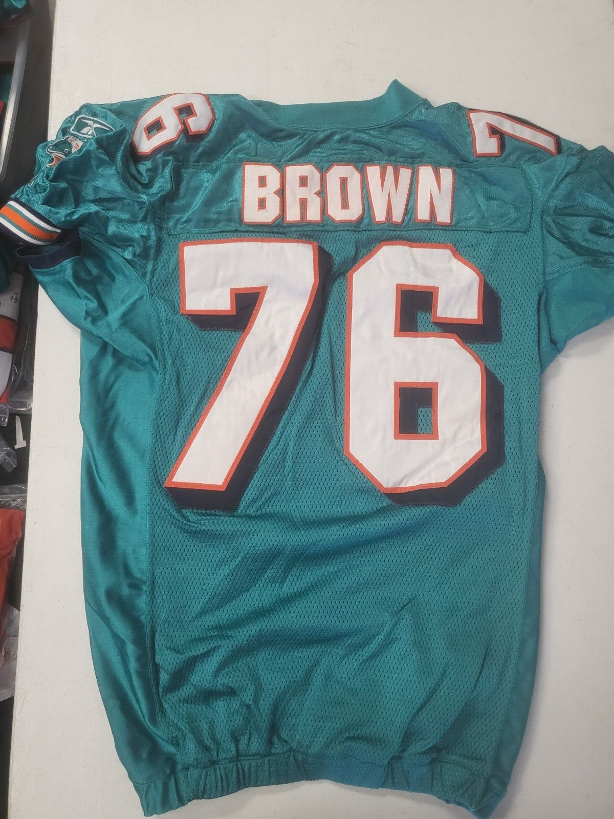 MIAMI DOLPHINS JAMES BROWN #76 GAME USED REEBOK NFL FOOTBALL JERSEY