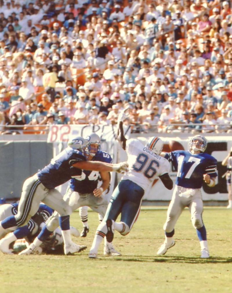 DAVE KRIEG SEATTLE SEAHAWKS VS DOLPHINS UNSIGNED 8X10 PHOTO 