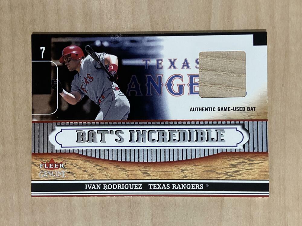 IVAN RODRIGUEZ TEXAS RANGERS 2002 FLEER GENUINE GAME USED BAT CARD