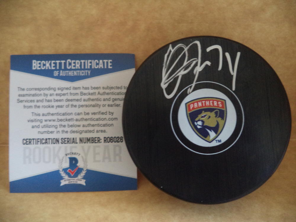 OWEN TIPPETT FLORIDA PANTHERS SIGNED AUTO PUCK ROOKIE YEAR BECKETT R06026