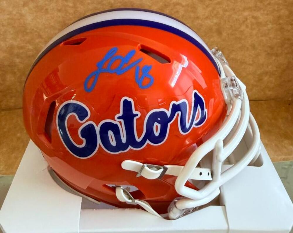 LOUIS OLIVER FLORIDA GATORS #18 SIGNED ORANGE MINI HELMET BECKETT 