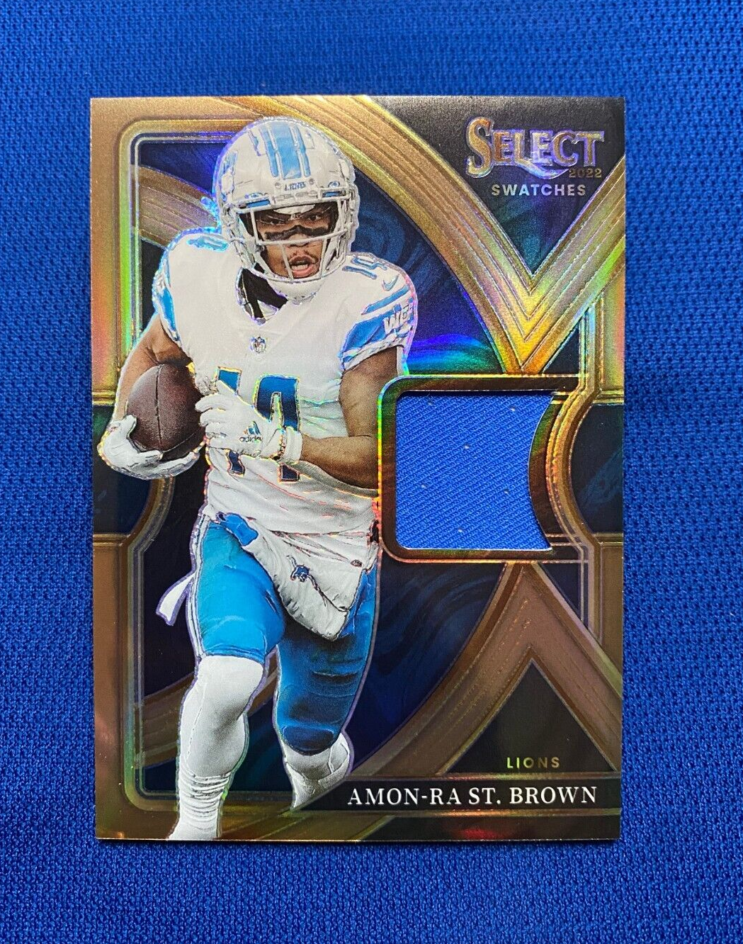 2022 PANINI SELECT AMON-RA ST. BROWN DETROIT LIONS JERSEY RELIC GOLD CARD /49