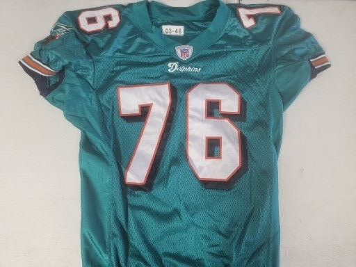 MIAMI DOLPHINS JAMES BROWN #76 GAME USED REEBOK NFL FOOTBALL JERSEY