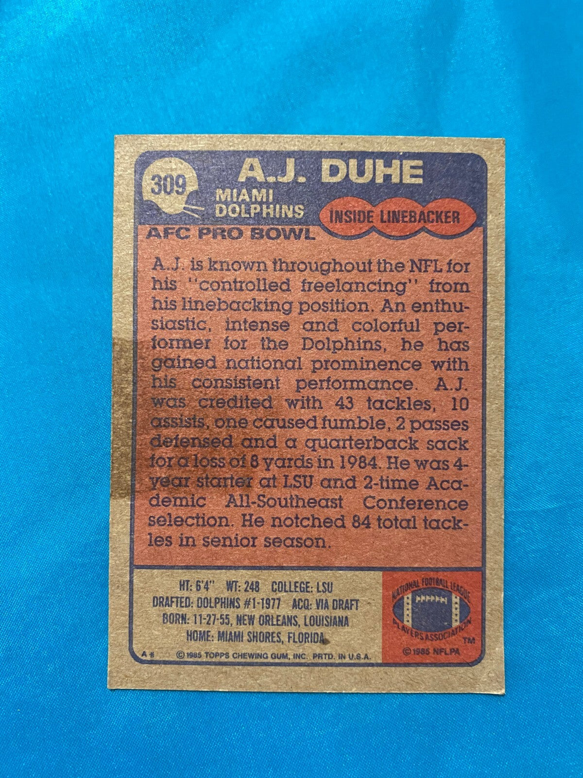 1985 TOPPS A.J. DUHE MIAMI DOLPHINS SIGNED AUTOGRAPHED AUTO CARD #309 W/COA