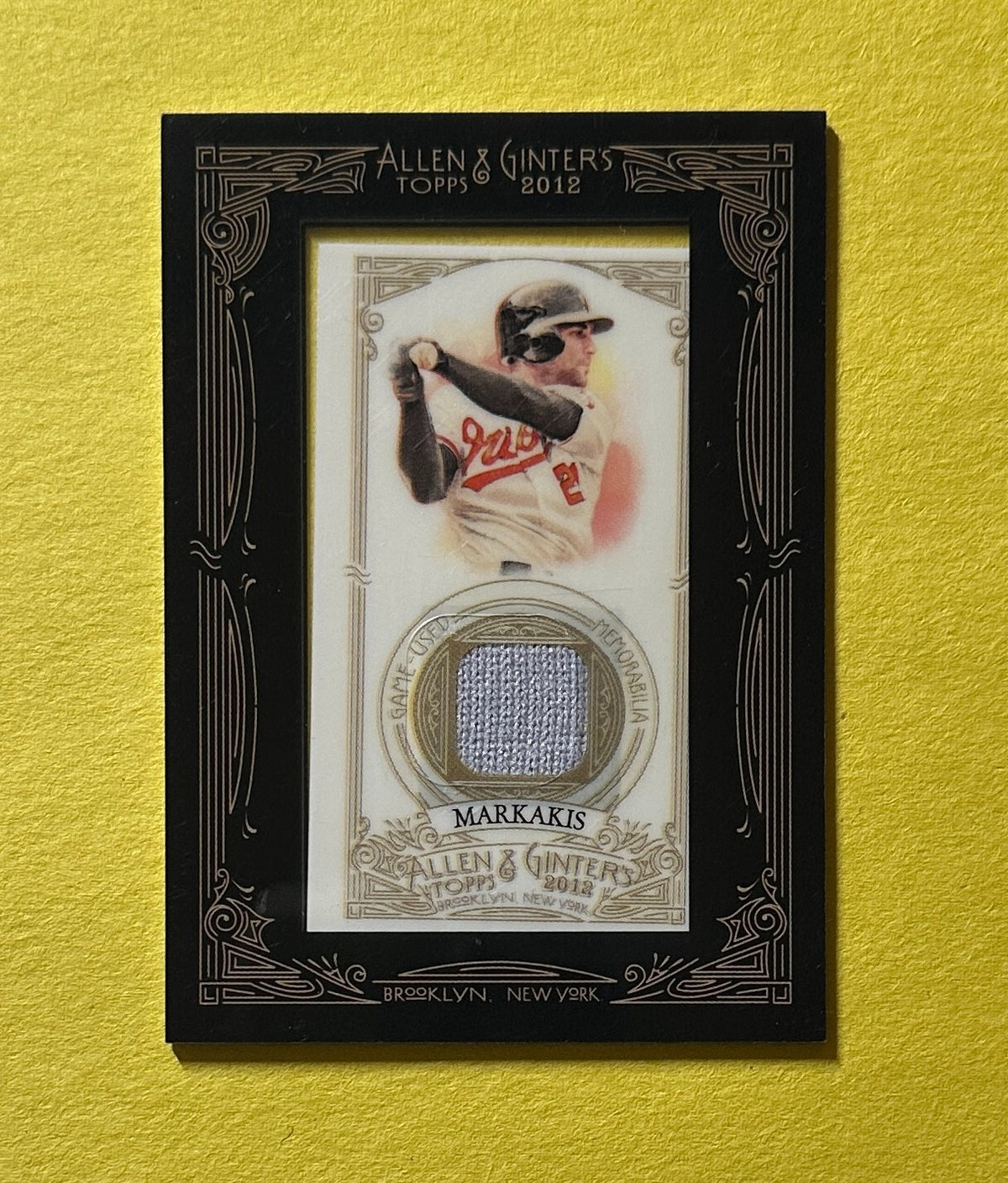 2012 TOPPS ALLEN AND GINTER'S NICK MARKAKIS RELIC #AGR-NM ORIOLES