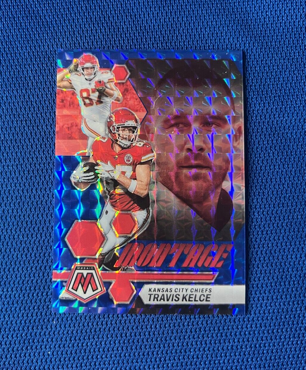 2023 PANINI MOSAIC TRAVIS KELCE KC CHIEFS MONTAGE BLUE PRIZM /99 #M-27