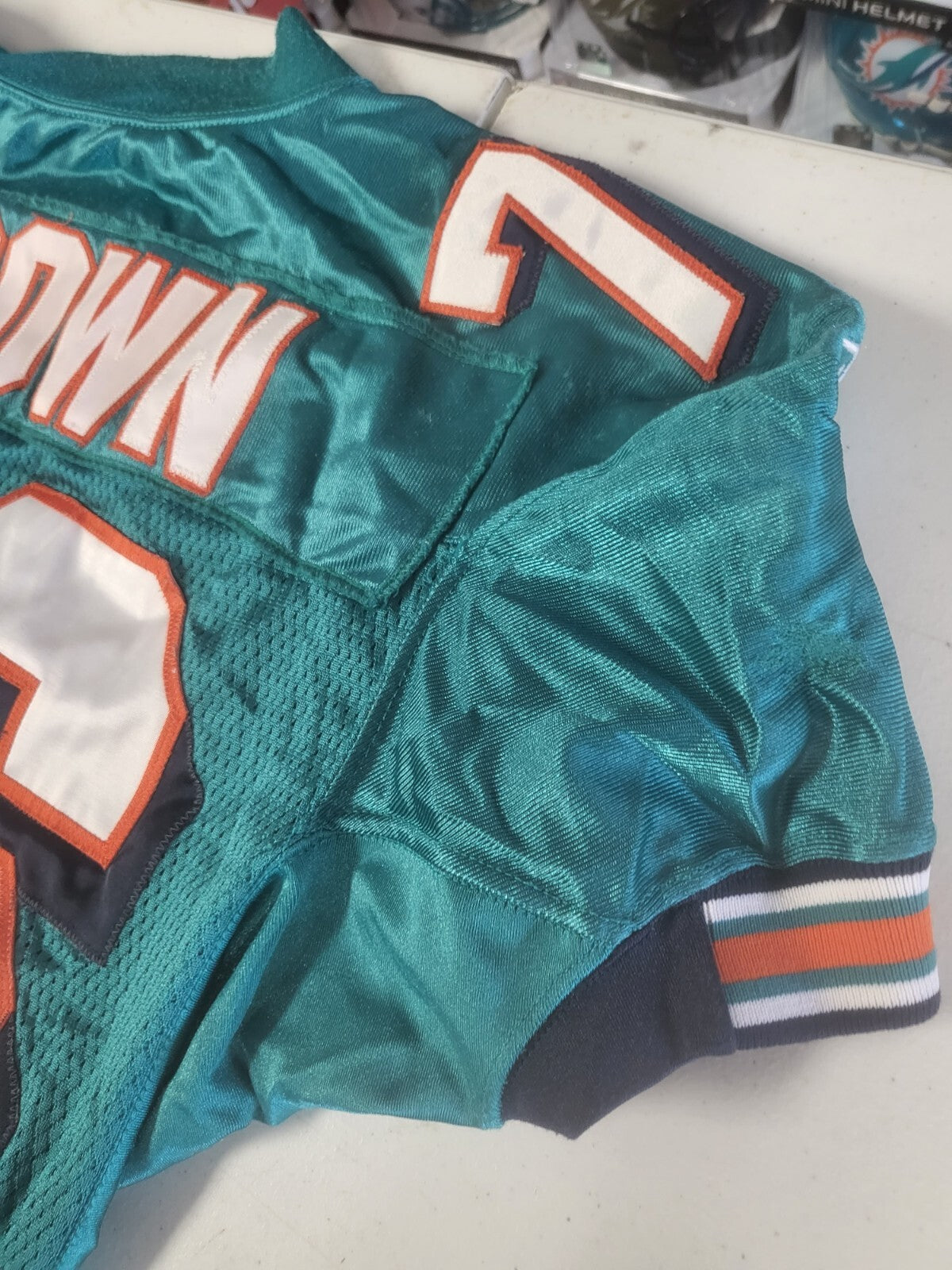 MIAMI DOLPHINS JAMES BROWN #76 GAME USED REEBOK NFL FOOTBALL JERSEY