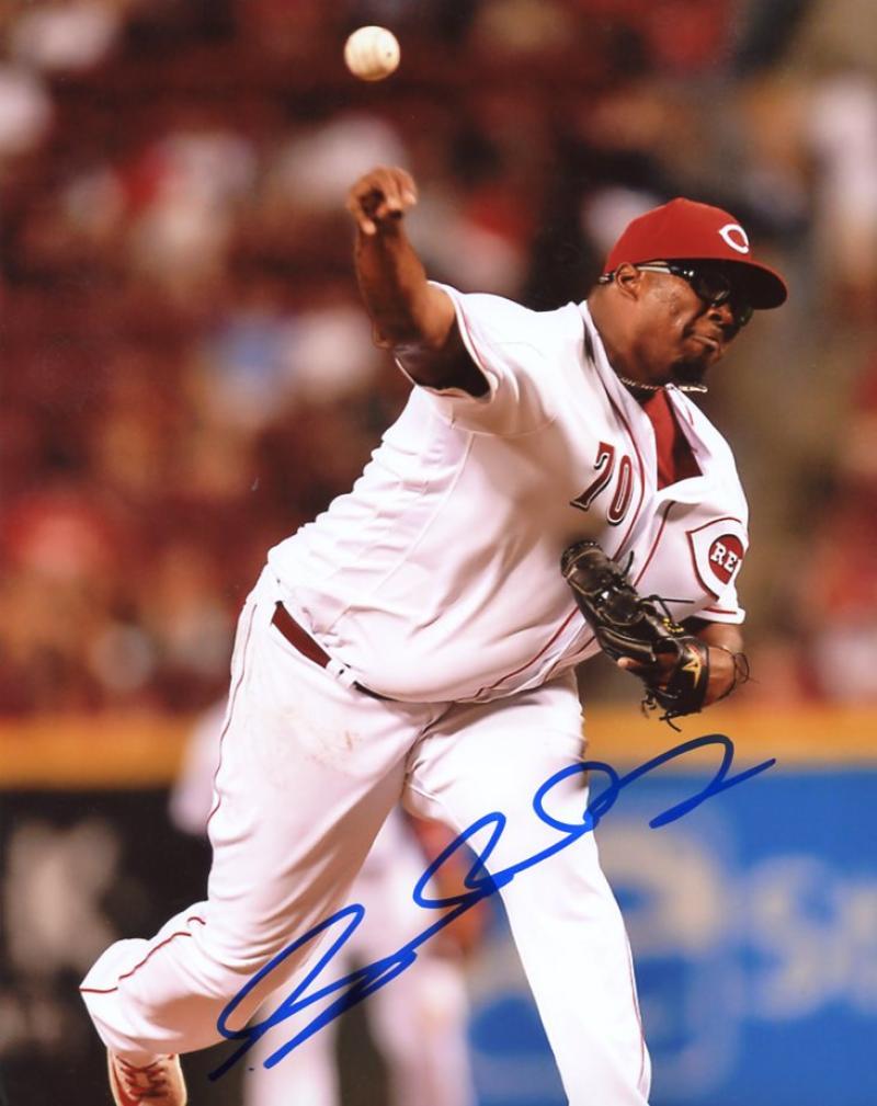 JUMBO DIAZ CINCINNATI REDS SIGNED AUTOGRAPHED ACTION 8X10 PHOTO W/COA