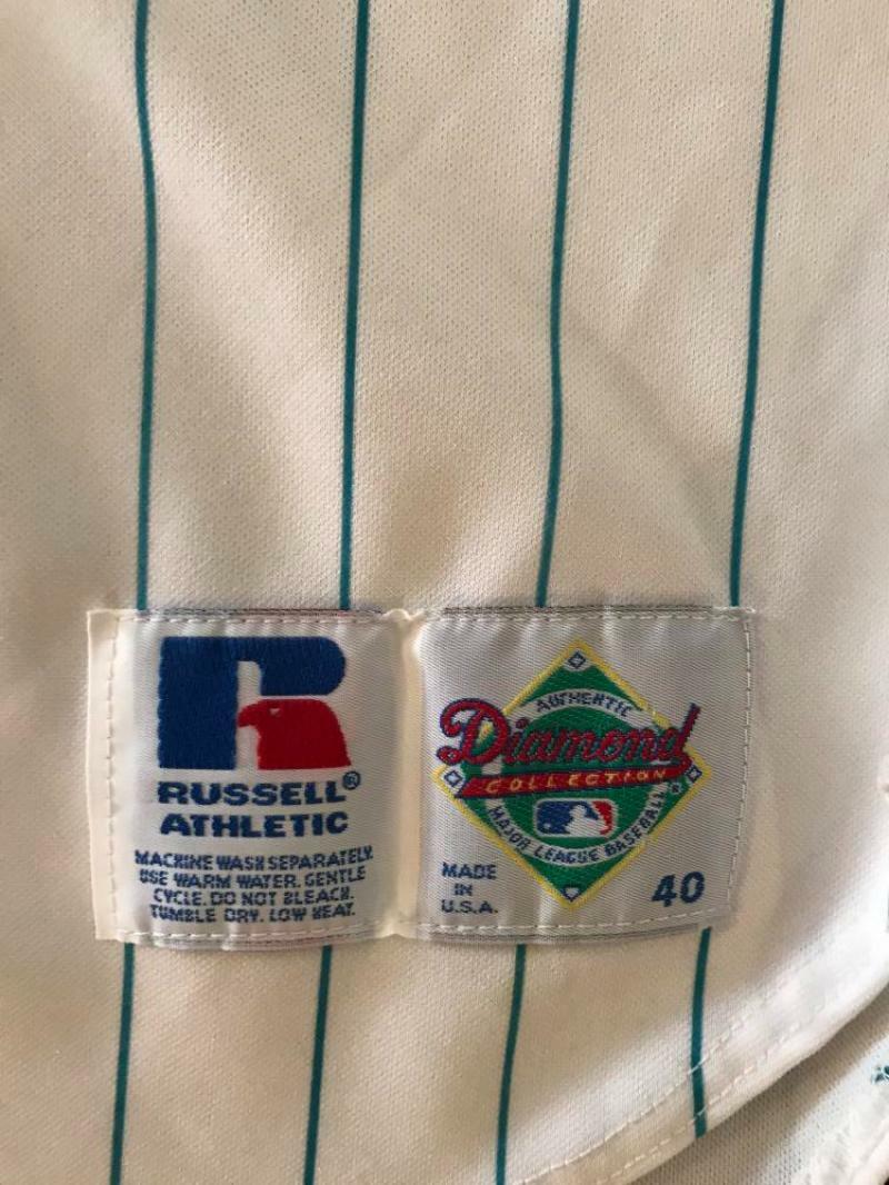 FLORIDA MARLINS SIZE 40 JERSEY SIGNED BY COUNSELL/ABBOTT/AL LEITER  WCOA