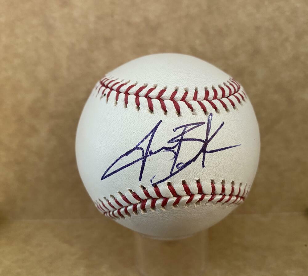 TRAVIS BUCK A'S/INDIANS/ASTROS SIGNED AUTOGRAPHED M.L. BASEBALL W/ COA